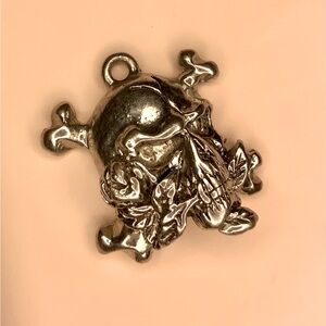Vintage Skull and Bones Pendant Biting a Rose